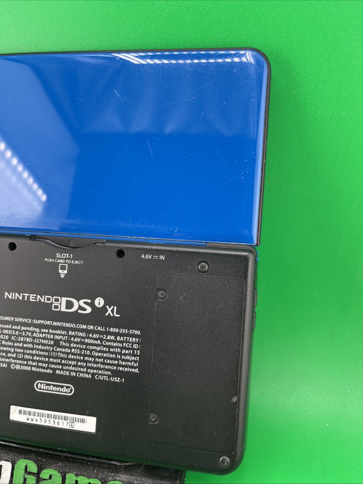 Nintendo DSi XL Blue Handheld Gaming Console with No Pen (T06)