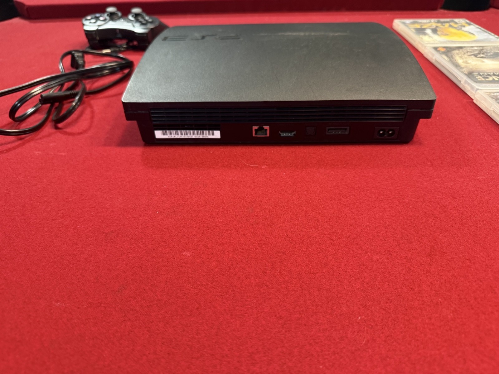 PS3 Slim Bundle: 1 Controller, 3 Games, Includes Power Cord and New 500 Gb HDD