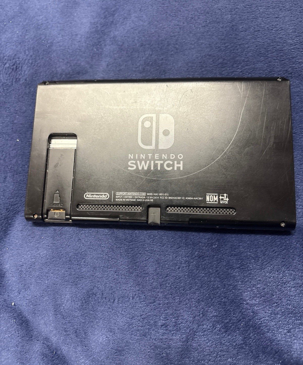 Nintendo Switch Console w/ Dock, Grip & Unopened Neon Purple/Orange Joy-Cons