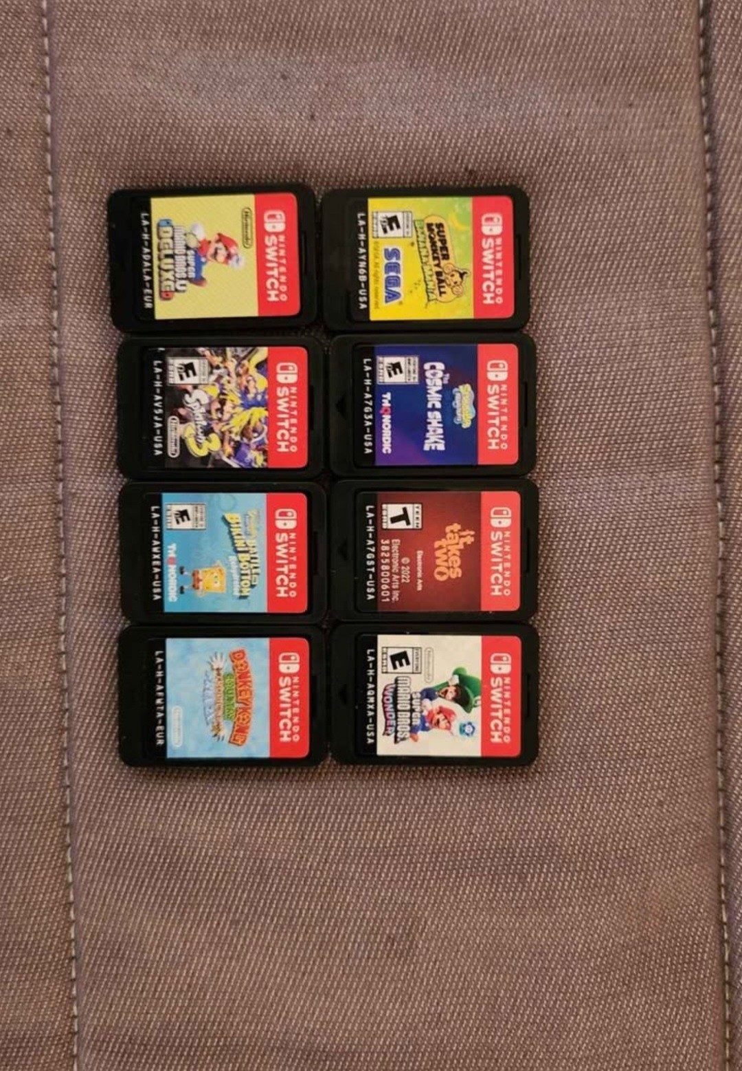 Nintendo Switch with Game Collection and Wired Controller