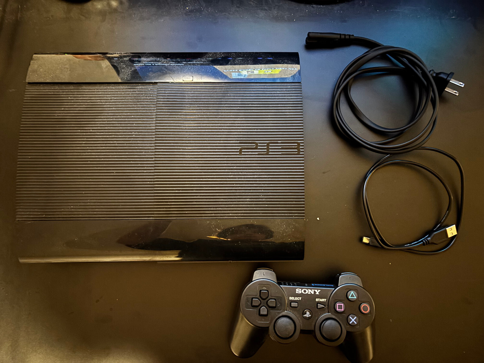 Sony PS3 Super Slim TESTED WORKING WITH CONTROLLER AND CABLES