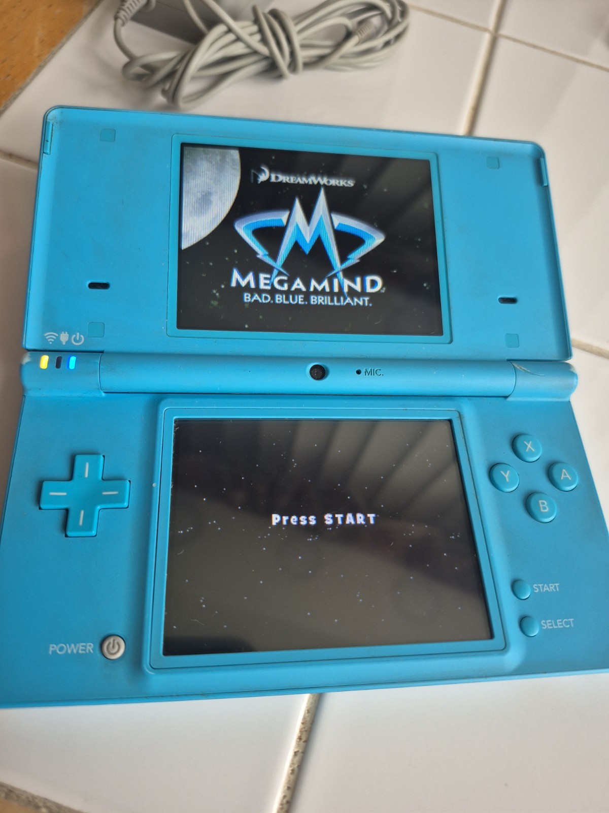 Nintendo DSi Light Blue Handheld System And Bundle Games