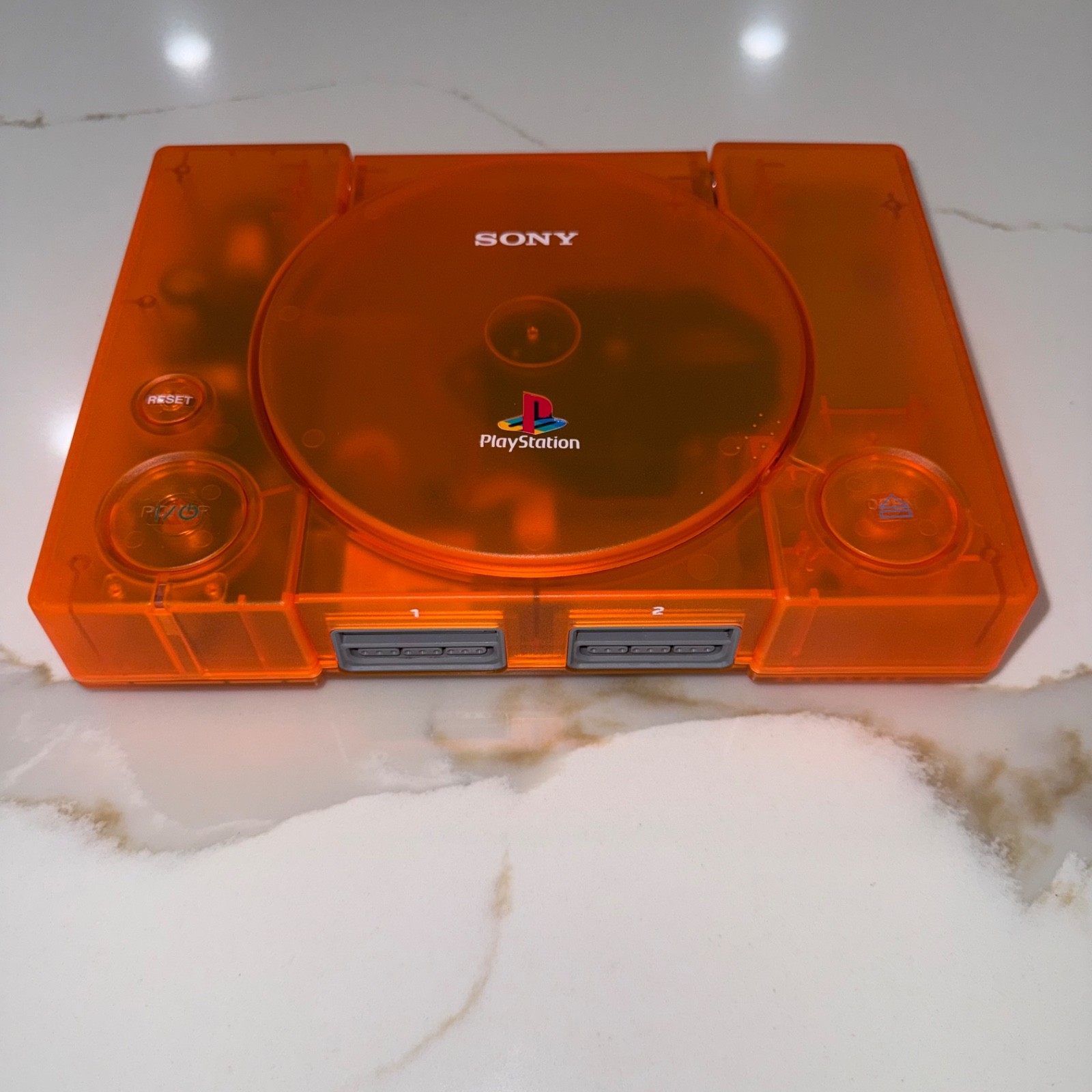 Sony PlayStation 1 Console (SCPH-5501) Bundle – Transparent Orange Clear Shell