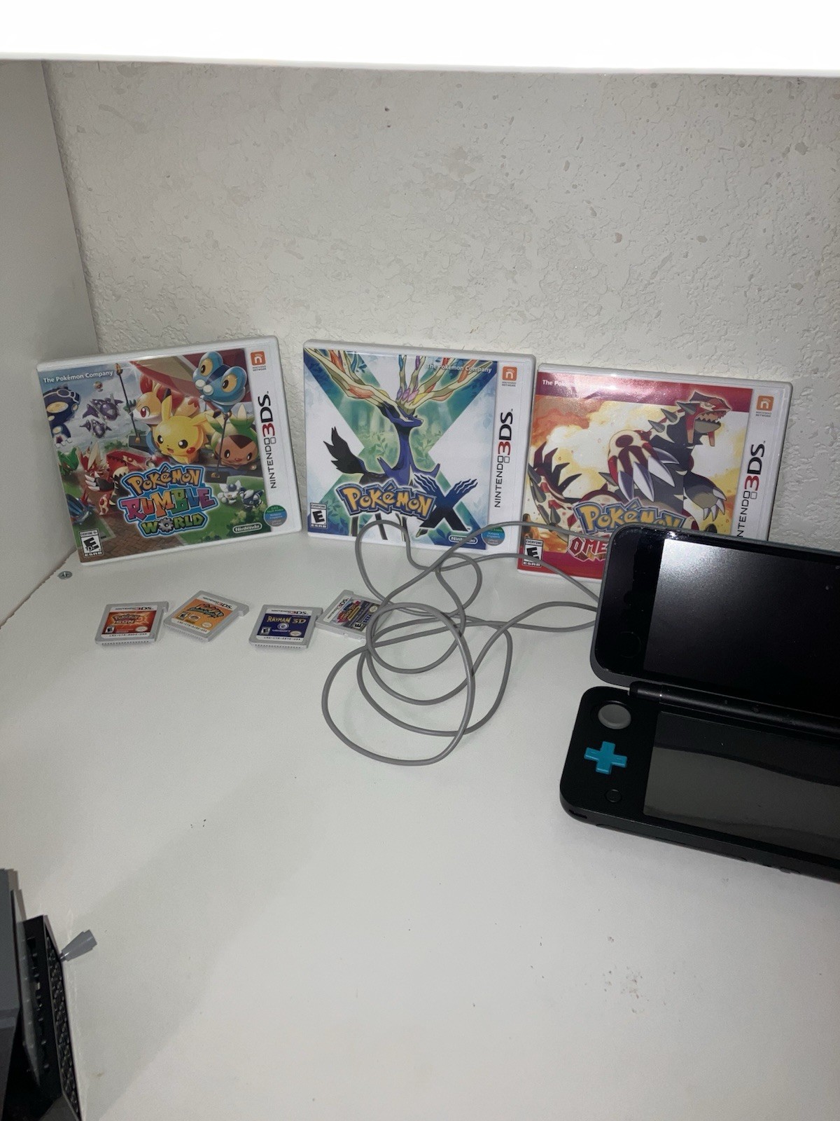 New 2ds Xl Complete In Box with Charger, Carrying Case, Pokemon Games, And More.
