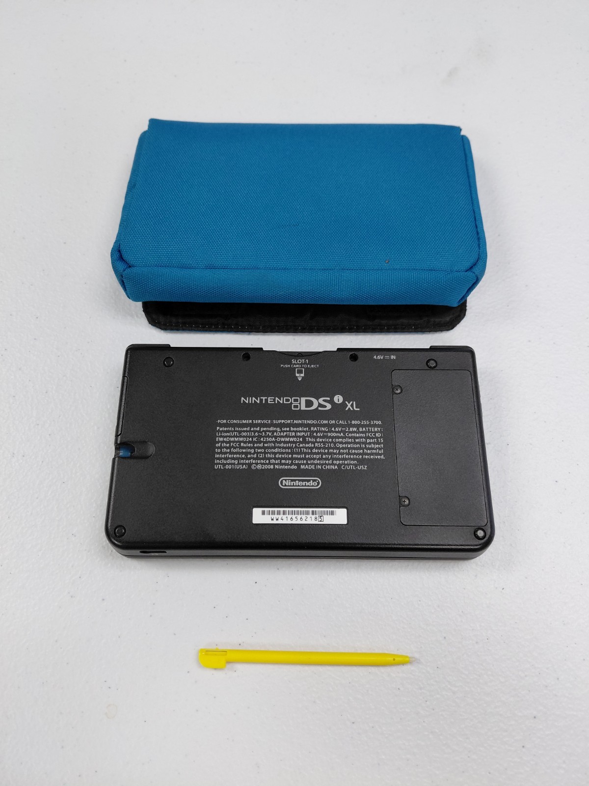 Nintendo DSi XL Blue Handheld System w/ Carrying Case & Yellow Stylus