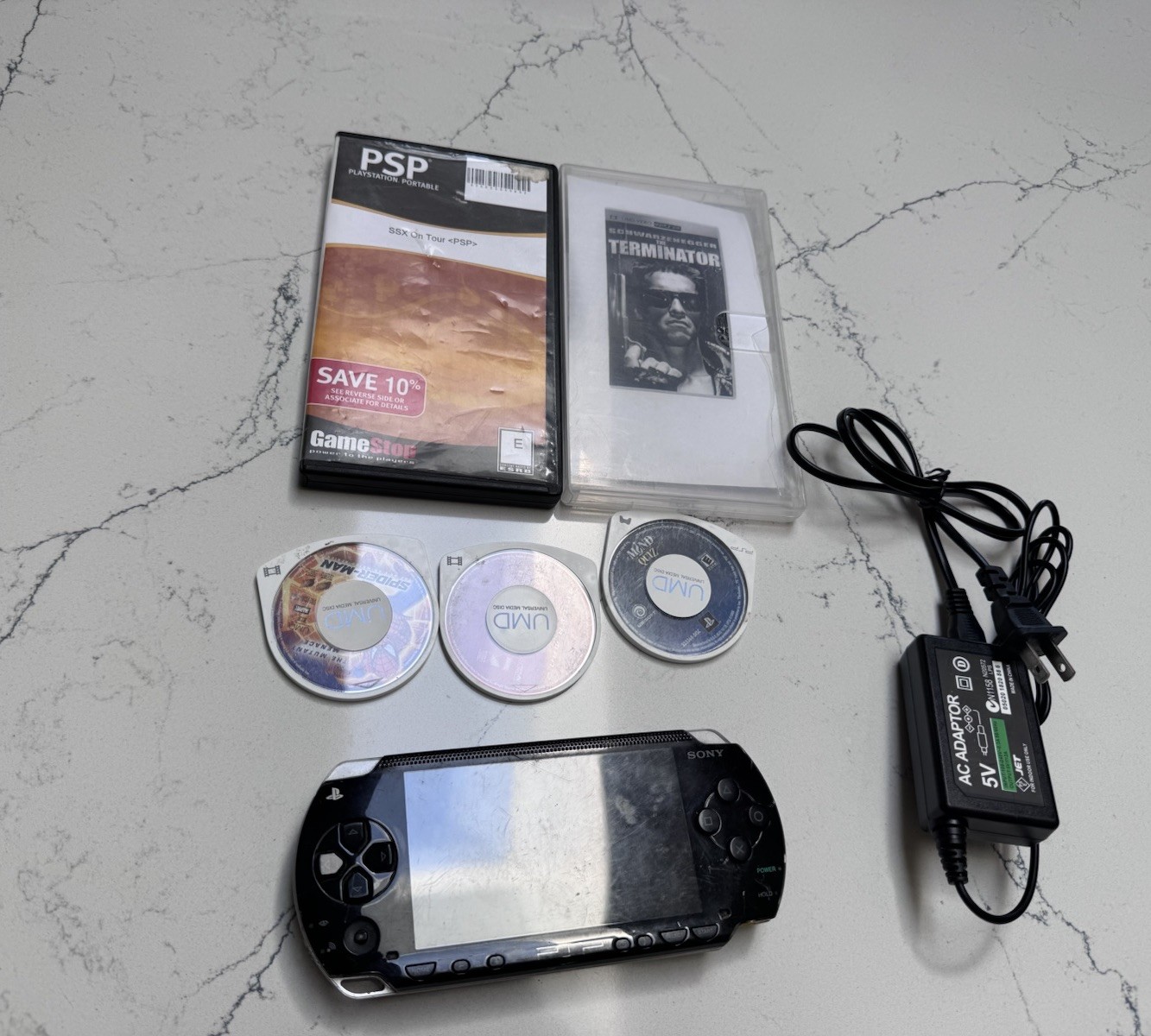 Sony PSP-1001 PlayStation Portable – Black With 5 Game Discs And Power Cord