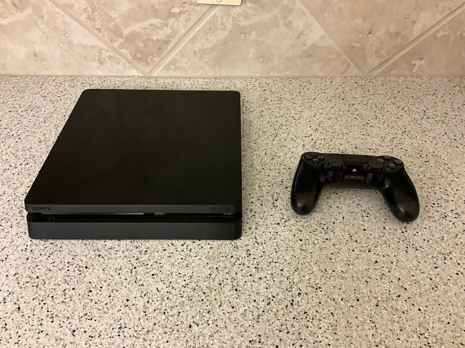 Sony PlayStation 4 Slim 1TB Console – Jet Black