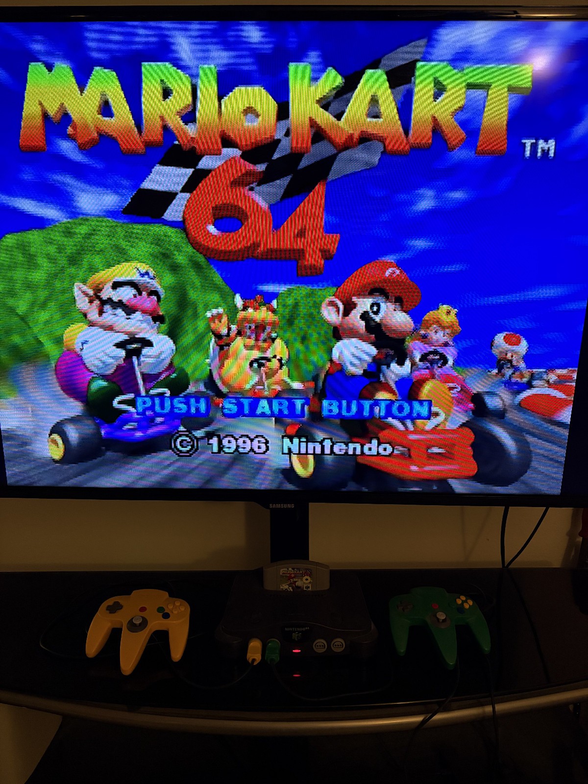 Nintendo 64 console bundle with Expansion Pak, two controllers, and Memory Pak.