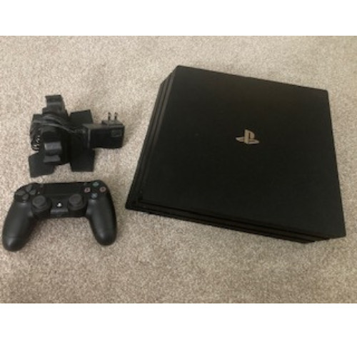 Black Play Station 4 Pro with one Controller and Charger
