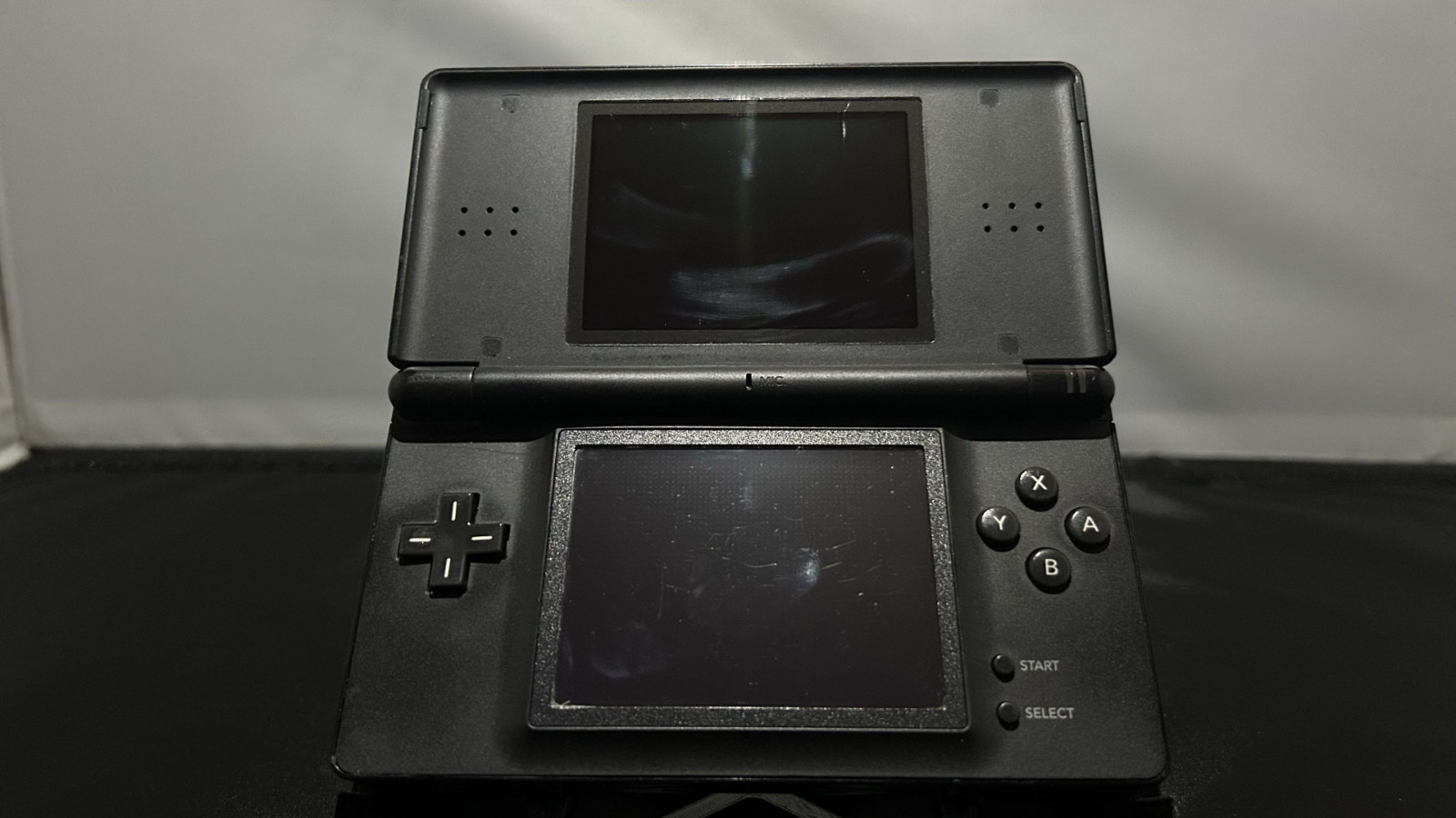 Nintendo DS Lite Handheld Console Black. No Charger. TESTED W/ Stylus/GBA Filler