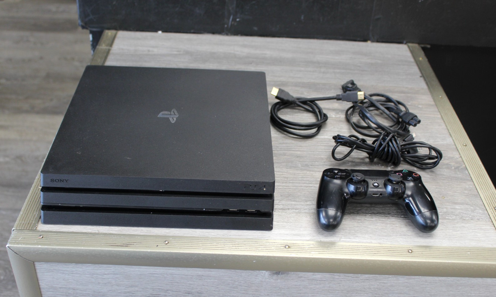 Sony PlayStation 4 Pro 1TB Game Console – Jet Black with Black Controller
