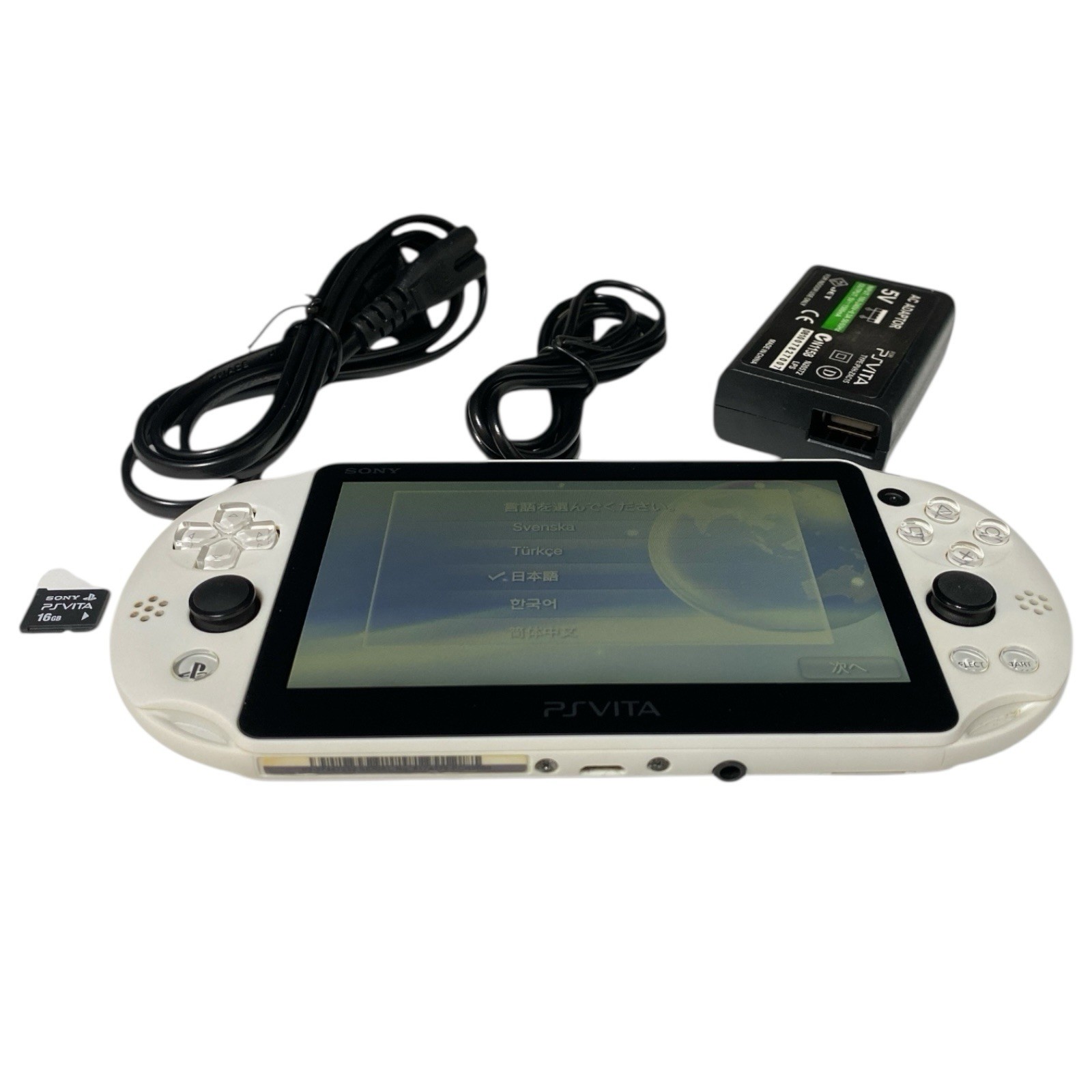 PS Vita PCH 2000 White Includes battery charger and 16GB memory card Used
