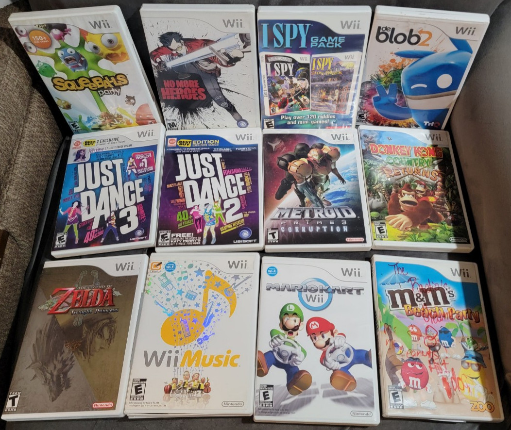 Nintendo Wii Console Bundle-24 Games 4 Remotes Metroid Mario Kart Zelda