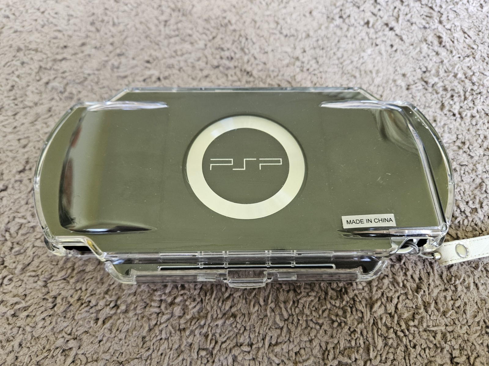 PSP 1001 with Case, Speaker Case, 32 MB Card, Charger, 2 Games, 1 Movie. Tested