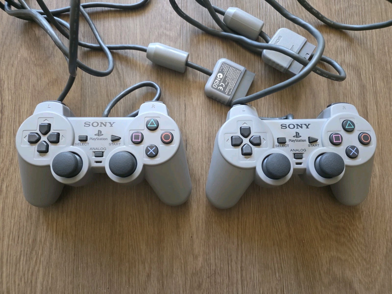 Sony Playstation 1 w/ 2 DualShock Controllers & 7 Games
