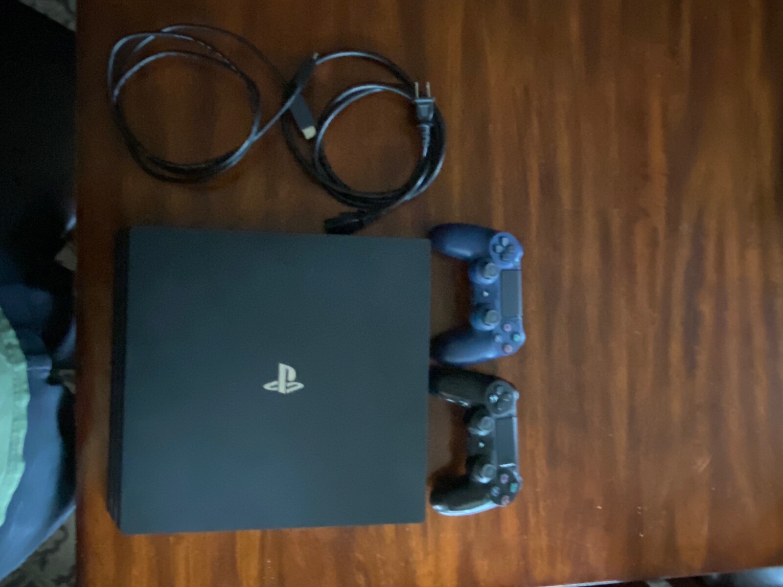 Sony PlayStation 4 Pro 1TB + Two Controllers and Necessary Cords