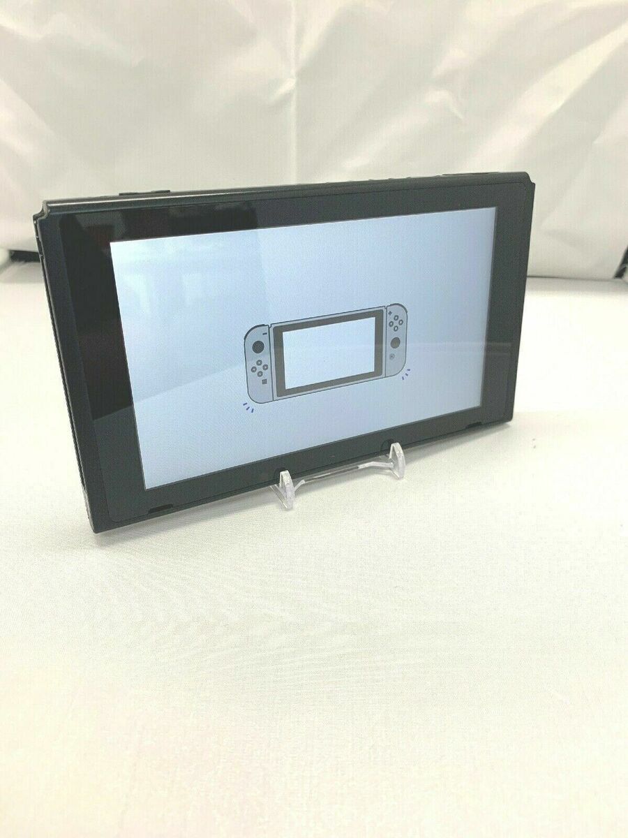 Nintendo Switch (Black) Slightly used with Super Smash Brothers