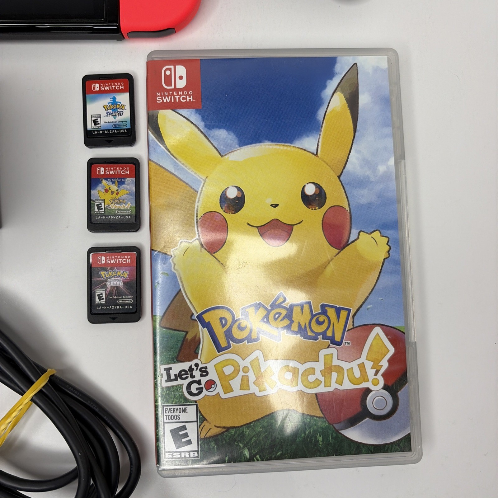 Nintendo Switch OLED bundle Lot ~ 3 Pokemon Games, HORI Joycons, Carrying Case