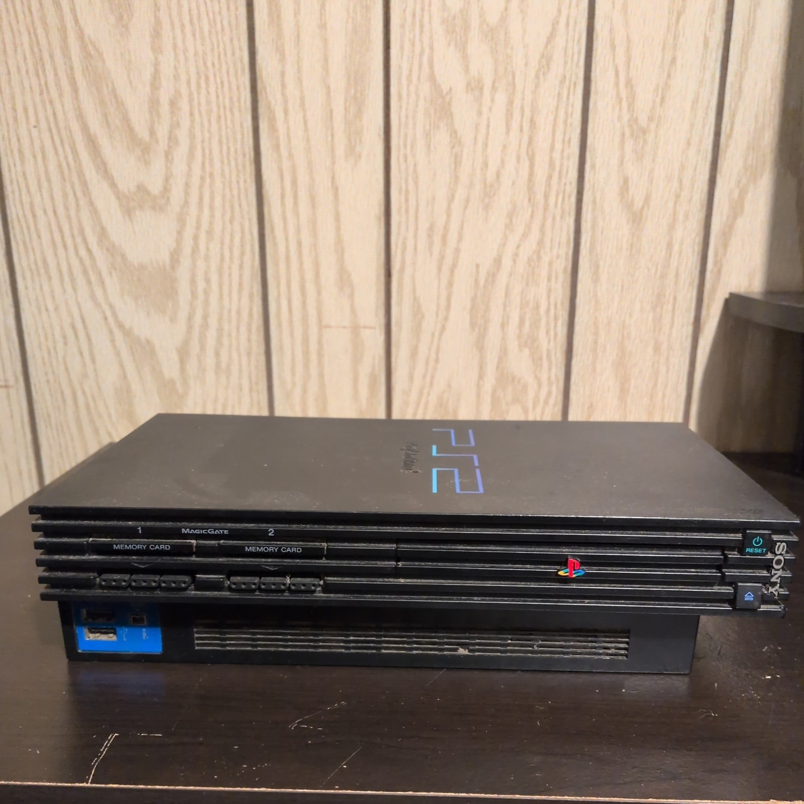 2 Sony PlayStation Consoles (w/Controllers, Cable, & 2 8MB Memory Cards)