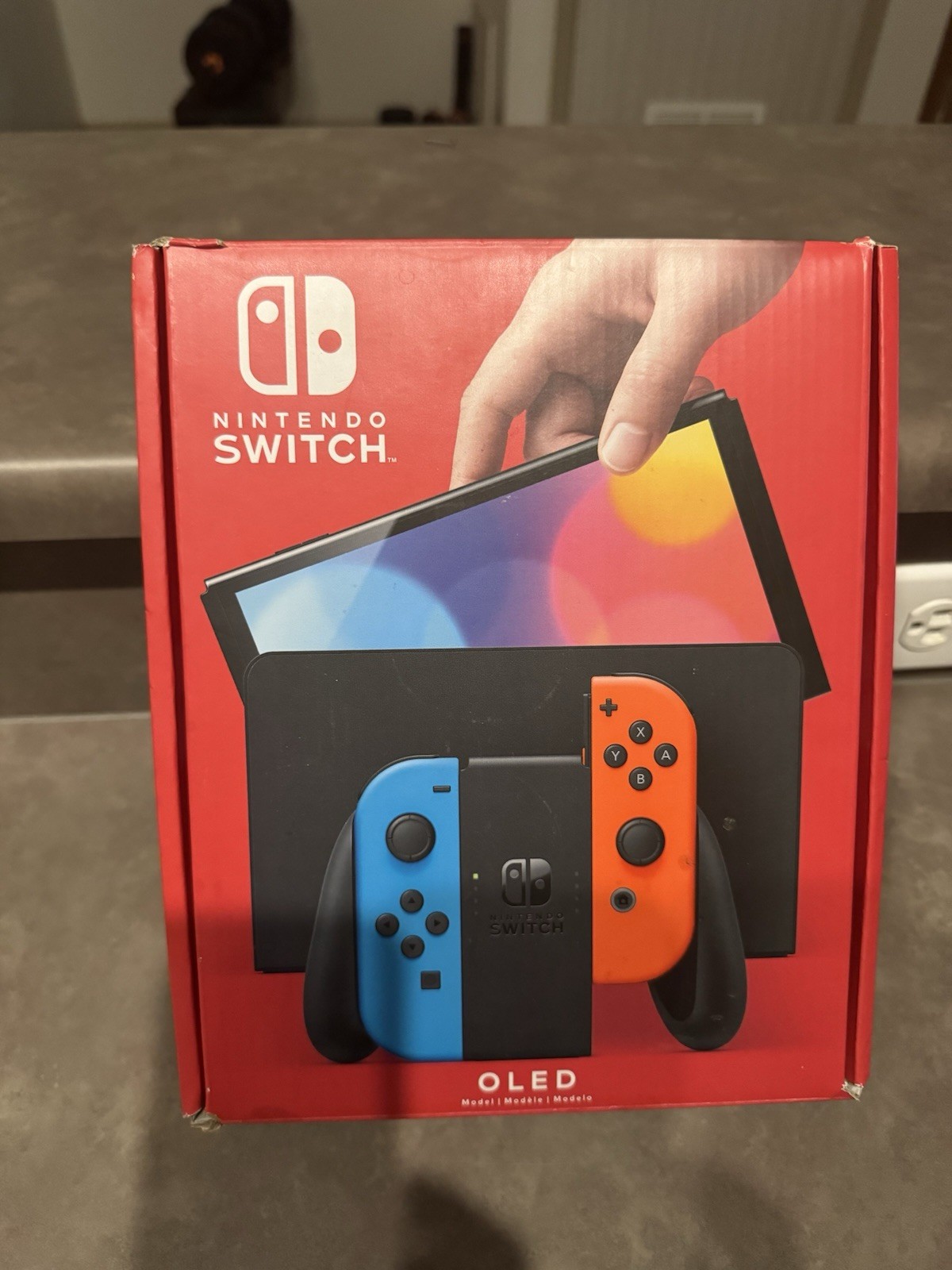 Nintendo Switch – OLED Model w/ Neon Red & Neon Blue Joy-Con
