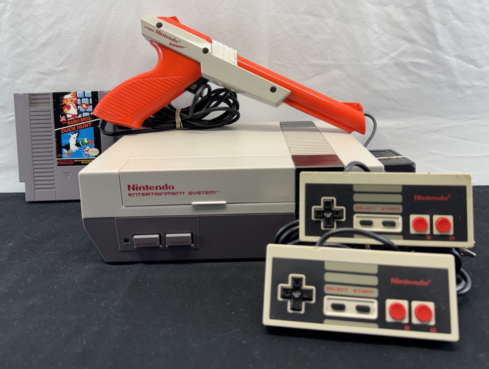 Nintendo Entertainment System NES-001 Tested Working w/2 remotes gun/game/Cords